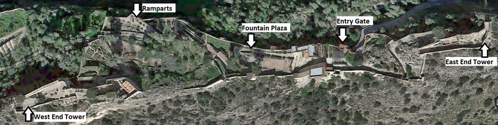 Aerial view of Fountain Plaza nestled in a rugged, natural landscape.