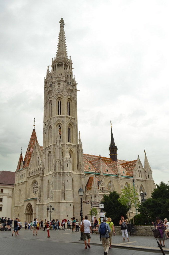 Historic Gothic-style church with tall spire and detailed architecture.
