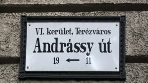 Street sign for Andr&aacute;ssy &uacute;t in Budapest's Ter&eacute;zv&aacute;ros district.