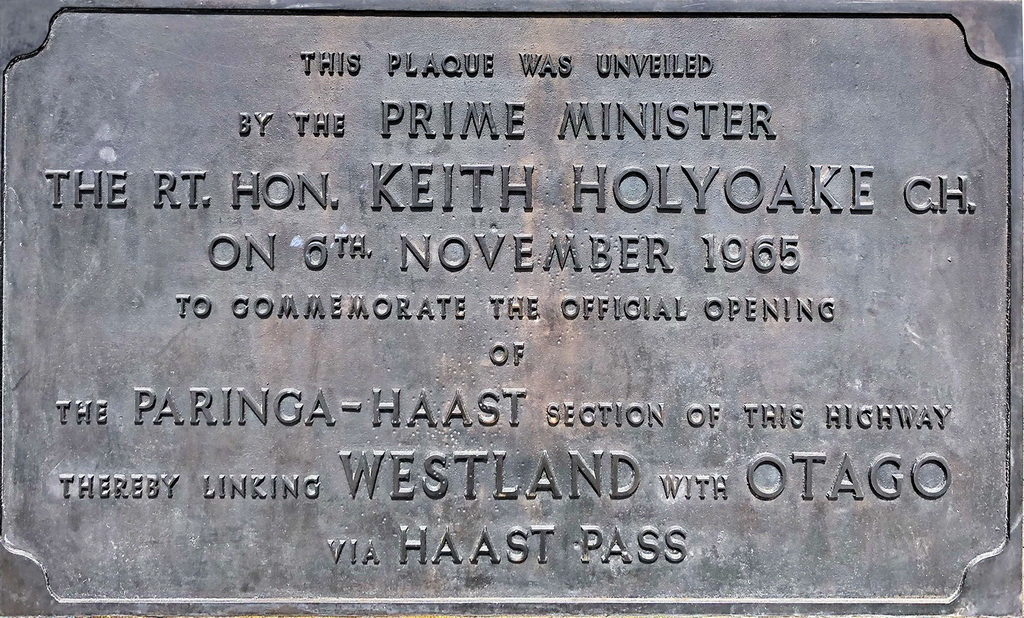 Satellite map showing a mountainous region with marked borders and lakes.