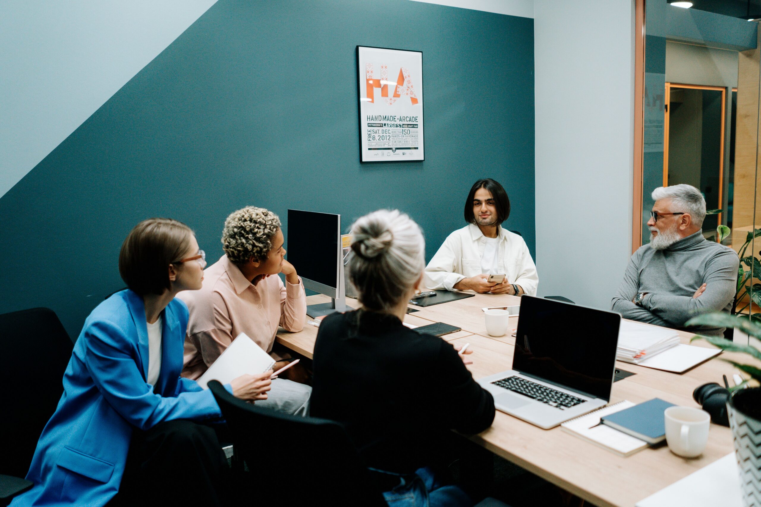 Team of colleagues discussing organizational strategy in a meeting